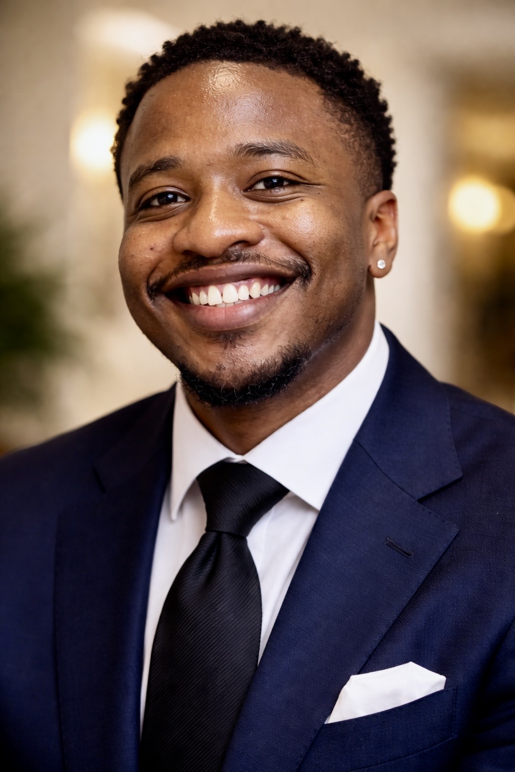 Clinton Feyisitan